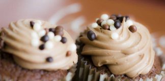 Brownie Cupcakes with Peanut Butter Frosting and Chocolate Sprinkles.