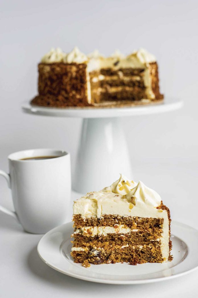Carrot Cake Carrot Cake with a slice on a plate in front of it