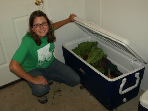 Liberty showing off the vegetable chiller Iron roots urban farm