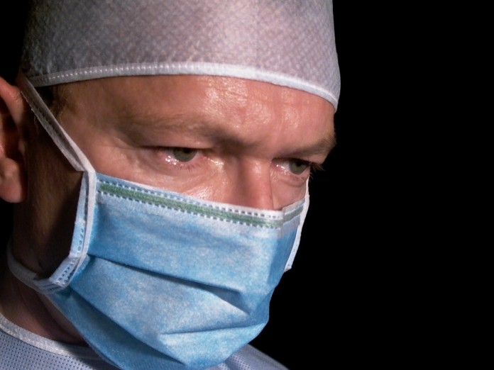 surgeon photo of surgeon