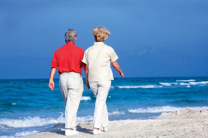 elderly-couple Elderly couple on the beach