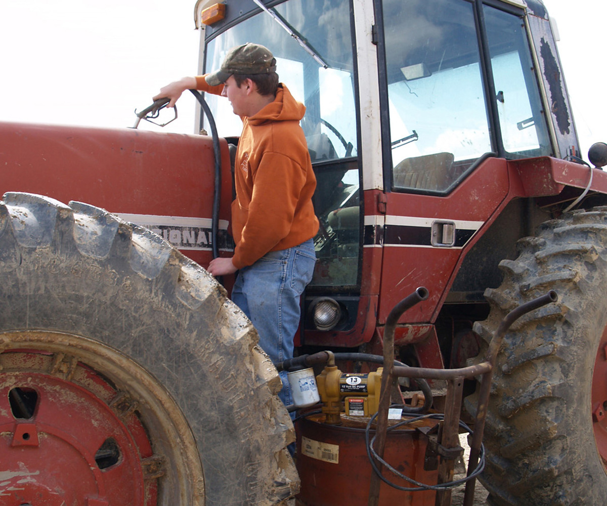Red tractor fueling