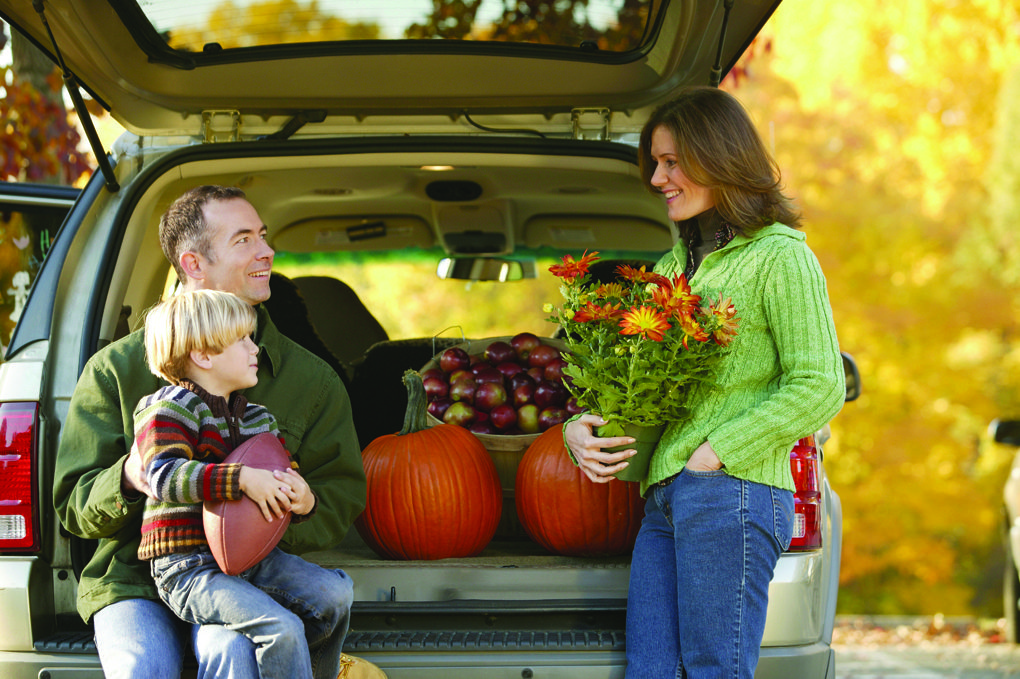 family with pumpkins