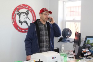 Answering the phone, and staying busy.