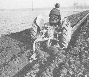 Man on Ford tractor