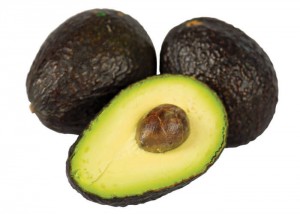 two whole avocados and one avocado cut open