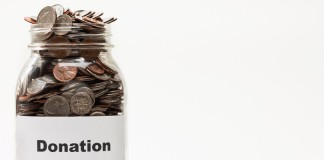 donation jar with coins