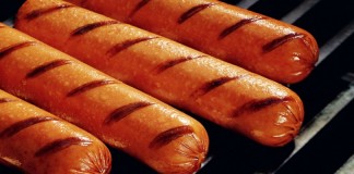hot dogs on grill