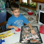 Troy Sudimak decorating gingerbread cookies
