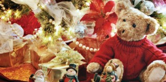 toys by Christmas tree