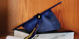 graduation mortarboard and diploma