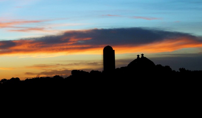 sunrise over farm sunrise over farm