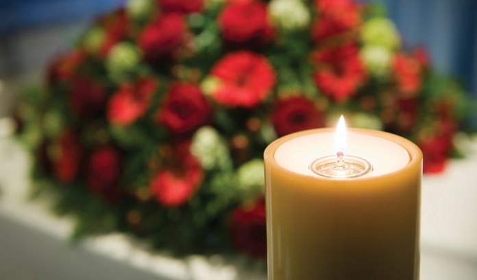 funeral flowers and candle funeral flowers and candle