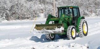 tractor plowing snow