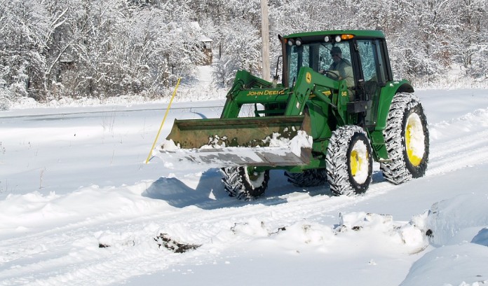 tractor plowing snow tractor plowing snow