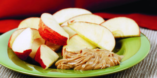 apple slices and peanut butter are healthy snacks