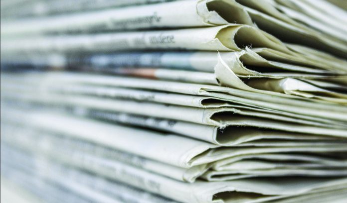newspaper pile newspaper pile/Susan Crowell column