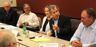 Senator Brown with farmers