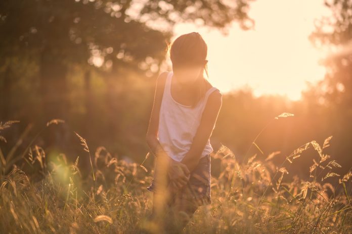 A girl at sunrise. A girl at sunrise.