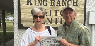 The Hittles visiting King Ranch in Texas with their Farm and Dairy in hand.