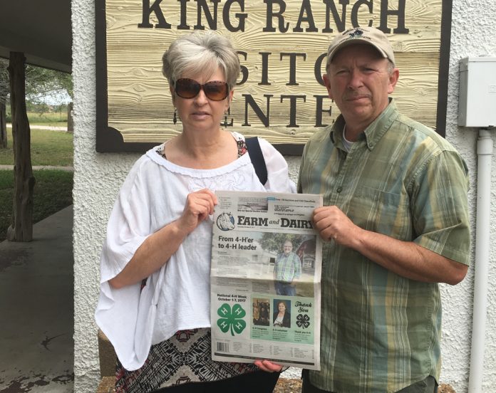 The Hittles visiting King Ranch in Texas with their Farm and Dairy in hand.
