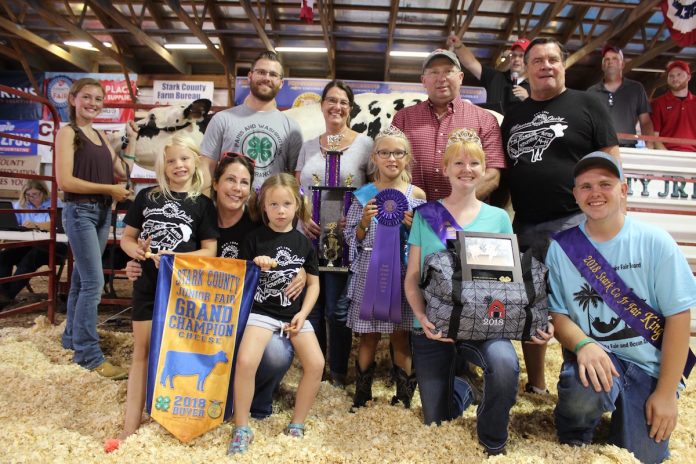 Stark grand cheese Morgan Campbell sold the grand champion dairy cheese for $6,000 to Paris and Washington Insurance, and Wallace Farms Feed & Drive-Thru.