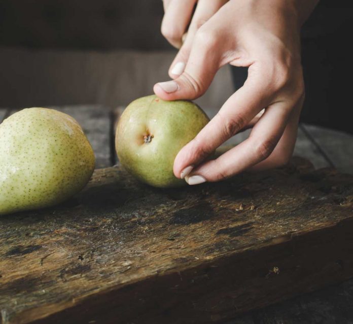 pears woman cutting pears