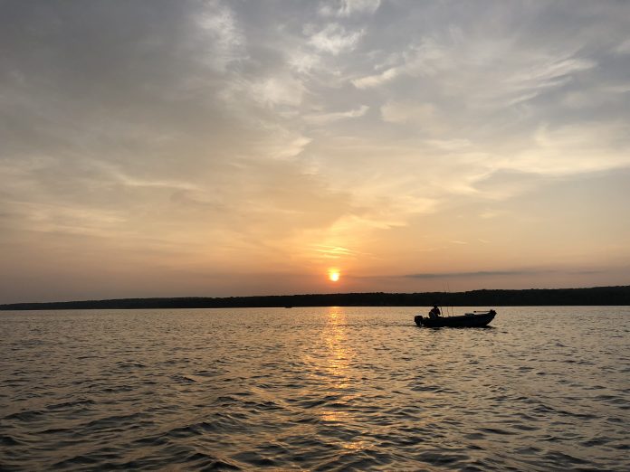 boat at sunrise boat at sunrise