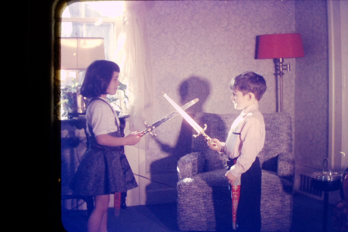 Kym Seabolt in a childhood sword fight. Kym Seabolt in a childhood sword fight.