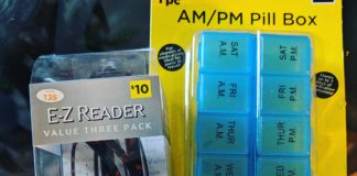 reading glasses and pill cases