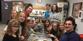 Rangers 4-H Members making toys for rescued rabbits.