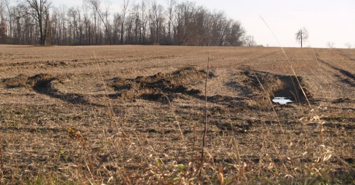 wet farm field rutted wet farm field, Ohio farm, planting,