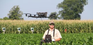 farmer flying drone