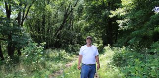 farmer on railroad bed