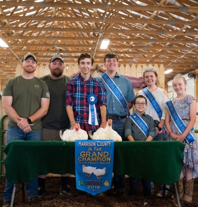Garrett Bossell’s grand champion market chickens sold to Encino Energy for $700
