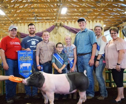 Grayden Sproull’s grand champion market hog sold to buyer Paris & Washington Insurance and D&J Sales and Service for $15 a pound.