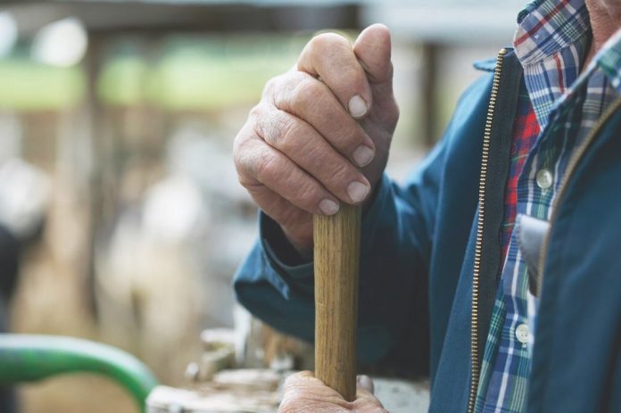 farm stress farmers hands on tool