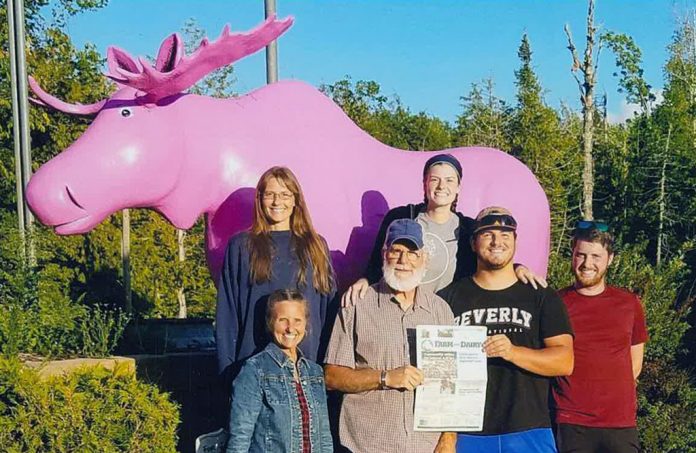 vac-rhoades The Rhoades family pose in front of the Pink Moose statue on Mackinaw Island