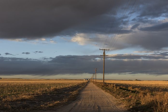 telephone lines on a country road telephone lines on a country road