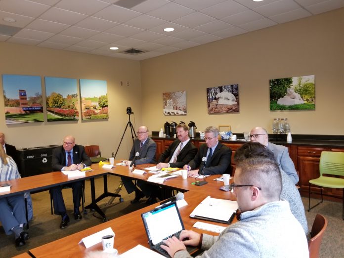 ag mental health roundtable guys sitting at table