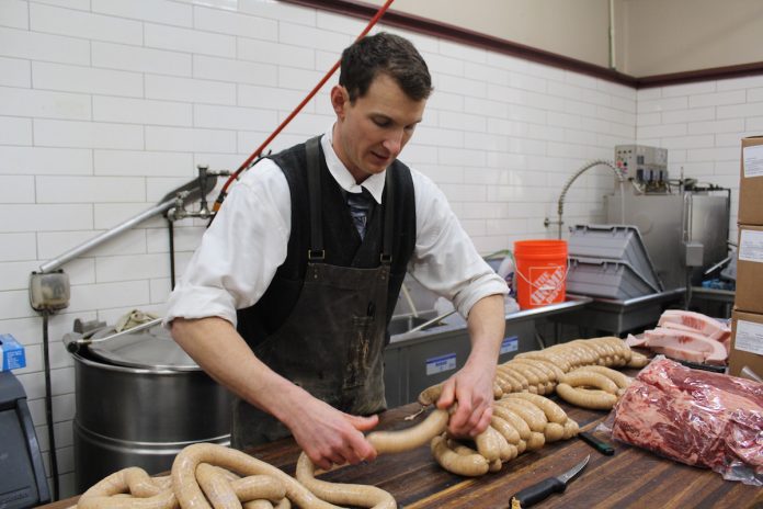 ohio-provisions-2 guy making sausage
