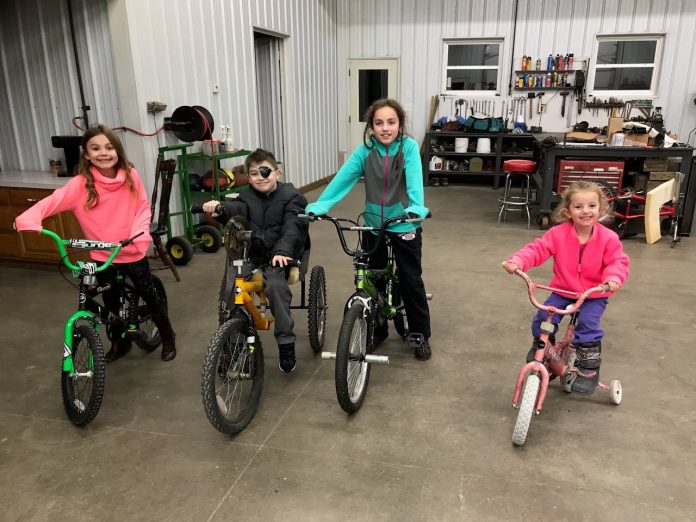 paralyzed 4-her-2 kids on bikes