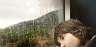 kid on a train