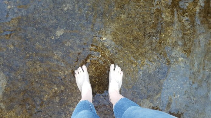 feet in a creek