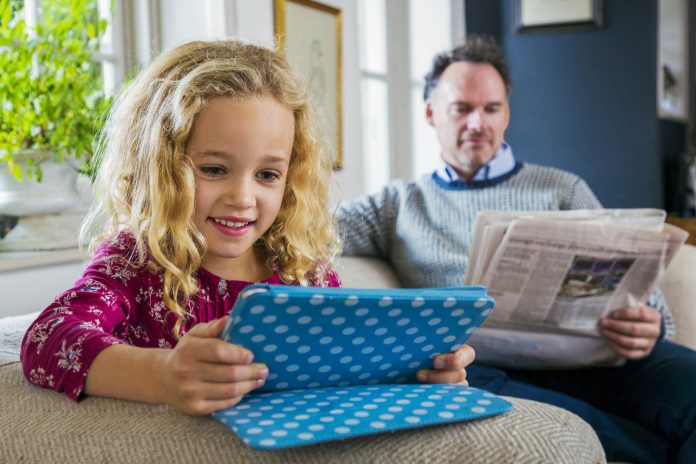 virtual learning girl sitting with tablet