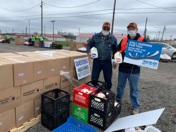 butler co farm bureau men with milk