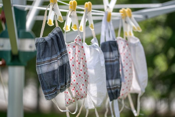 masks on a clothes line masks on a clothes line