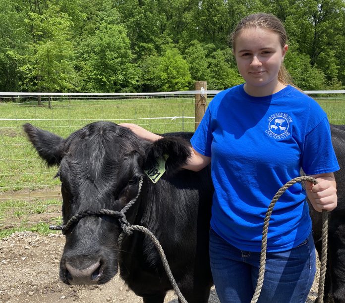 Maggie Byers and her steer, Levi. (Submitted photo) Maggie Byers and her steer, Levi. (Submitted photo)