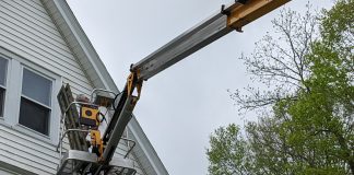 Kym Seabolt's husband removing window shutters