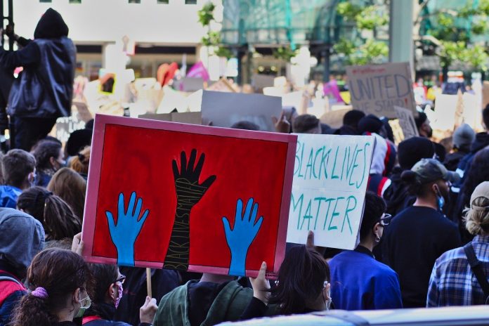 black lives matter sign at a George Floyd protest black lives matter sign at a George Floyd protest